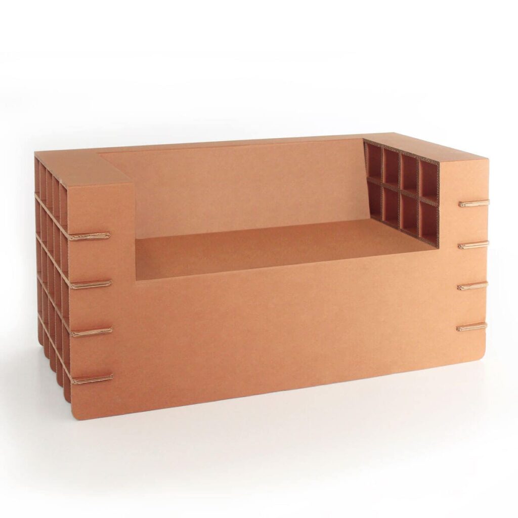 Canapé modulable en carton écologique avec compartiments intégrés pour rangement, design épuré et poignées métalliques pratiques pour l'accès aux tiroirs, idéal pour espaces professionnels ou bureaux créatifs - Le Meuble en Carton une marque du groupe Natur Design