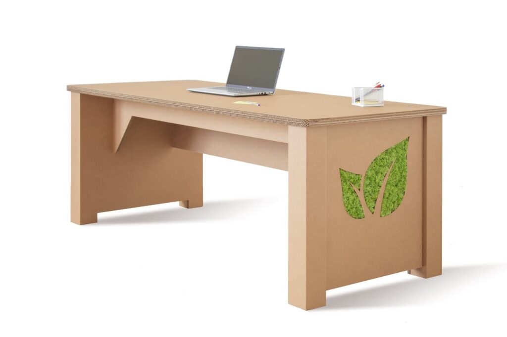 Bureau en carton écologique pour aménagement d'entreprise ou salle de pause, avec plateau perforé et design végétal imprimé sur les côtés. Idéal pour espaces professionnels durables et modulables dans des bureaux, open space ou zones collaboratives - Le Meuble en Carton une marque du groupe Natur Design