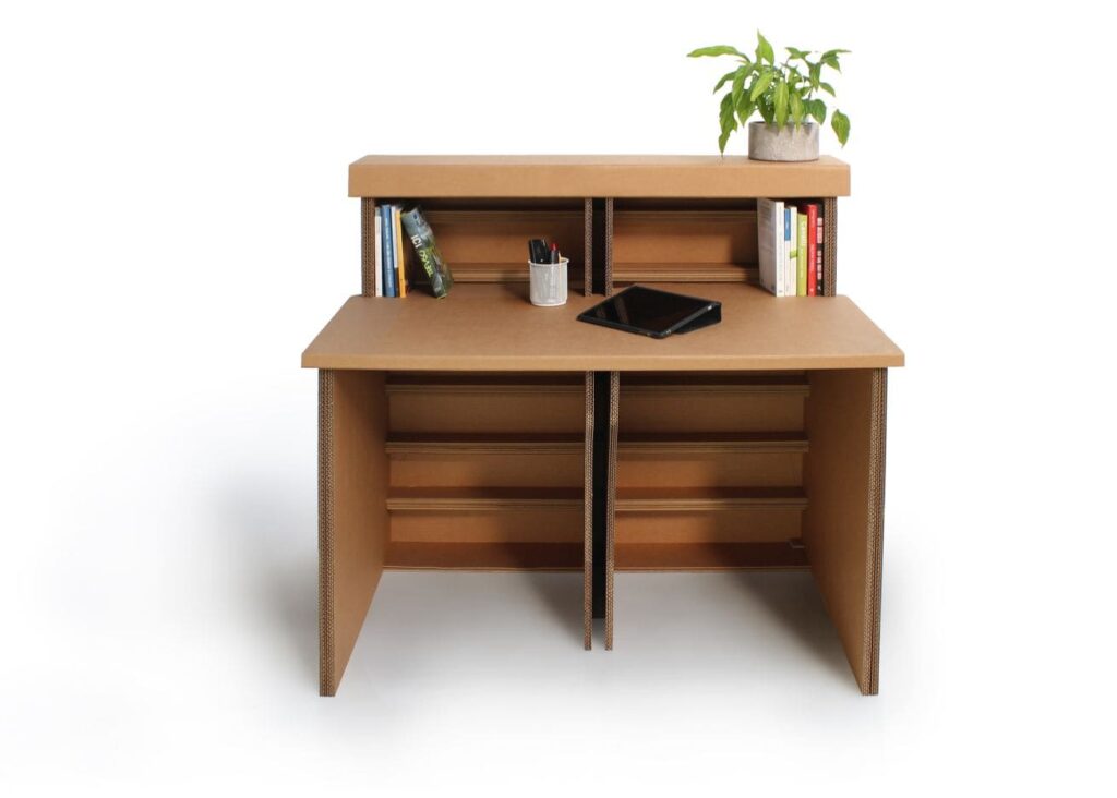Banque d'accueil en carton écologique pour stands événementiels ou aménagement de magasins, avec plateau central et rangements modulables en hauteur. Idéale pour accueil client dans des espaces professionnels ou salons professionnels - Le Meuble en Carton une marque du groupe Natur Design