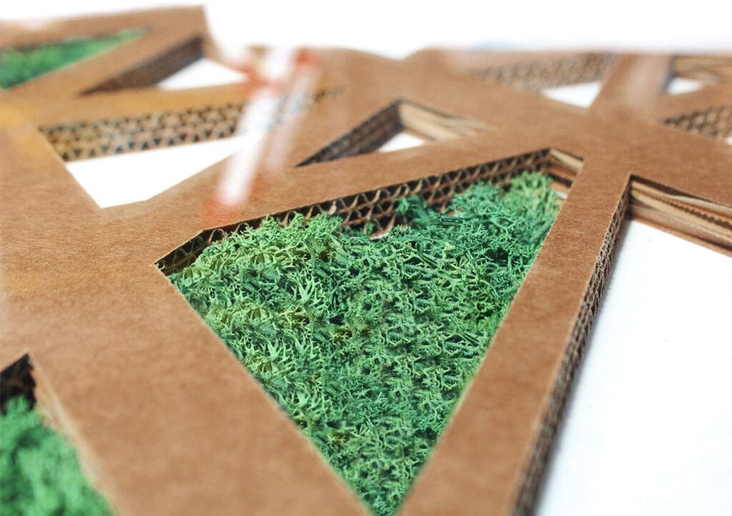 Détail d'un plateau de bureau en carton écologique avec revêtement végétalisé, conçu pour les espaces professionnels comme les bureaux et salles de pause - Le Meuble en Carton une marque du groupe Natur Design