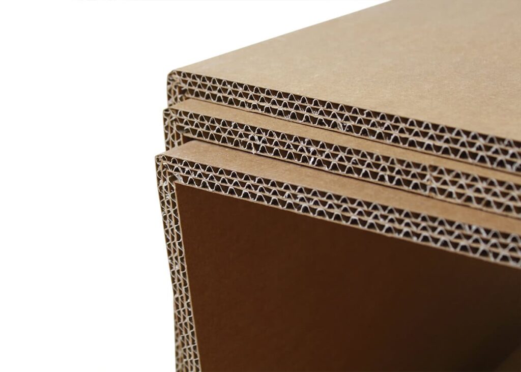 Structure en carton recyclé et robuste, vue détaillée du panneau structurel d'une table basse écrins pour aménagement des entreprises et salles de pause, idéale pour espaces professionnels durables et écologiques - Le Meuble en Carton une marque du groupe Natur Design