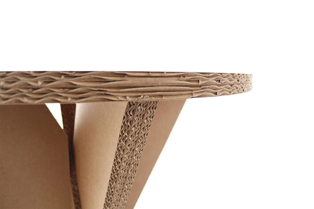 Table en carton écologique OLYMPE avec plateau décoratif texturé, idéale pour l’aménagement d’entreprises et les salles de pause, structure robuste en panneaux cartonnés - Le Meuble en Carton une marque du groupe Natur Design